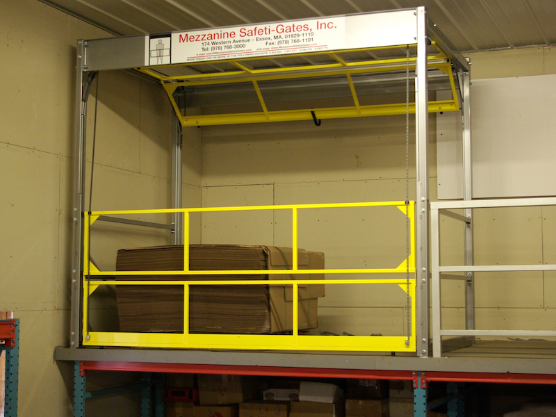 Safety barrier gates and retractable safety straps for loading dock safety