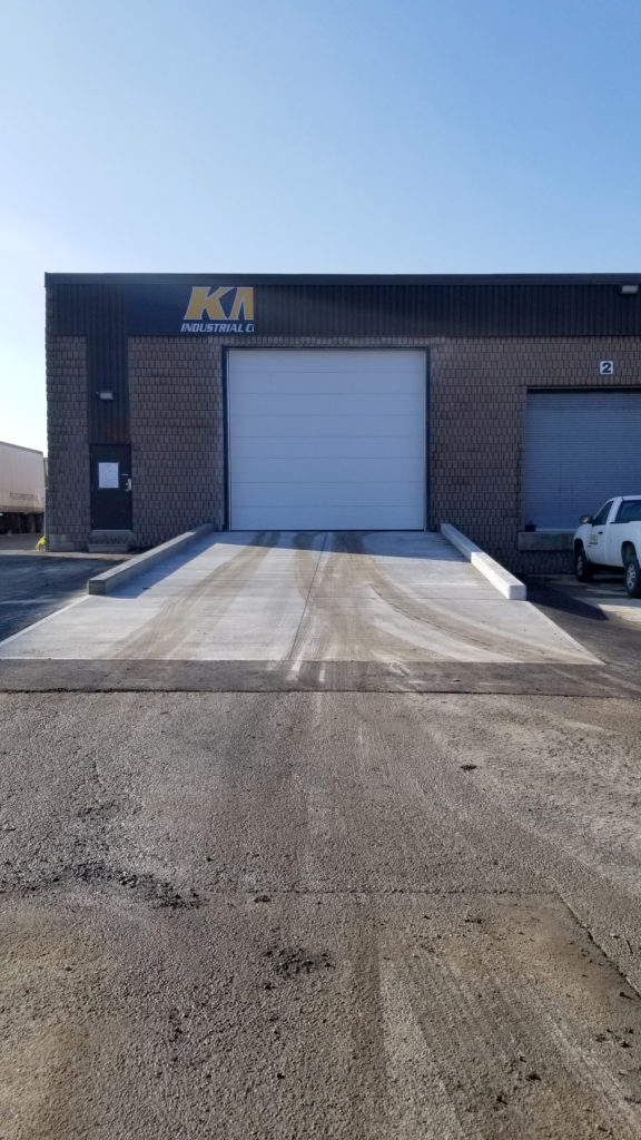 KMJ Overhead Sectional Steel Door and Ramp in Brampton Ontario from centre