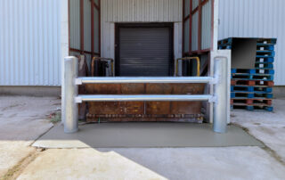 After Galvanized bollards and steel docking wall