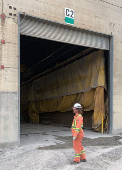 Before rolling steel door outside calgary manufacturing plant
