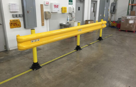 SlowStop guardrail warehouse guarding flexible rebounding polycarbonate railing in use protecting pedestrian walkway