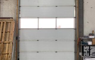 After polycarbonate door section window natural light inside brighter space inside calgary alberta
