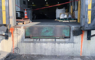 Before Rusted loading dock leveler plate and missing dock bumpers calgary alberta