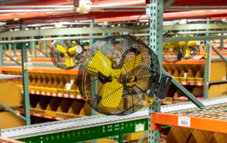 BAF Big Ass Fans directional fan AirEye with occupancy sensor racking mount in warehouse