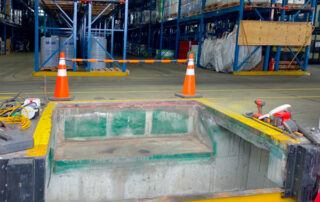 during replacement hydraulic dock leveler burnaby BC warehouse old dock removed