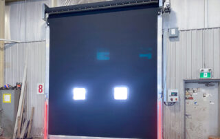 after hormann TNR high-speed springless direct drive rubber door HD-DD 3065 with windows lit-advance door monitoring lights red position 8 peterbrough manufacturing plant