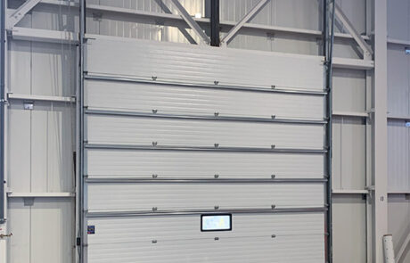 whitby warehouse 16'x16' sectional overhead door with window panel before