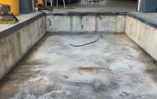 Etobicoke warehouse During Removed rusted dock and cleaned dock pit re/re