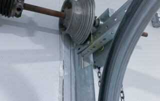 overhead dock sectional door preventive maintenance PMP After - Position 2 – Drive-In Door - New cables installed